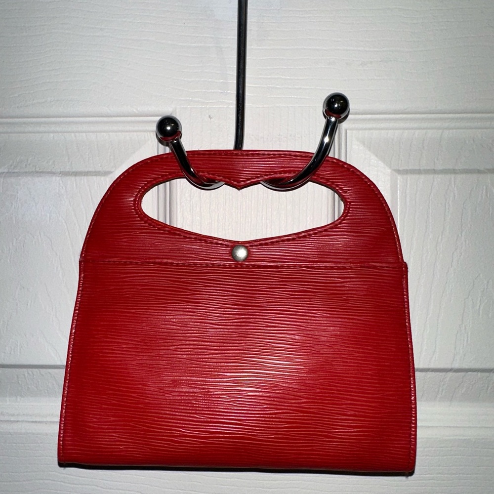 Bold Red Clutch with Textured Leather and Structured Shape